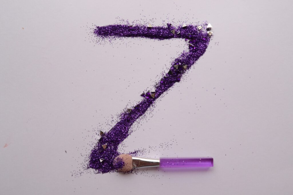 letter Z made with purple glitter paint